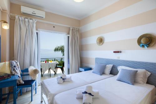  Casa dei Venti - Sea View Apartments - 100m from the beach, Pension in Benitses