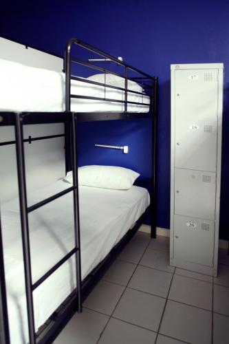 Bunk bed in 22-Bed Mixed Dormitory Room room in Smugglers Cove Beach Resort and Hotel