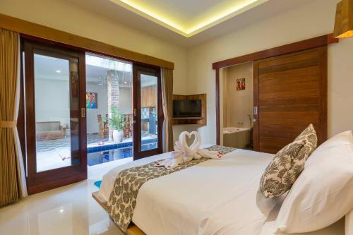 Nalin Bali Villas Stop at Nalin Bali Villas to discover the wonders of Bali. The property has everything you need for a comfortable stay. Free Wi-Fi in all rooms, daily housekeeping, private check in/check out, express