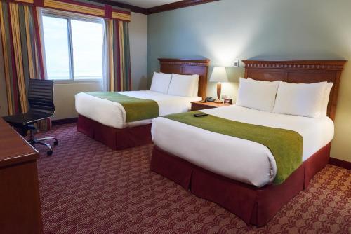 Suites las Palmas, Hotel & Apartments. – San Salvador