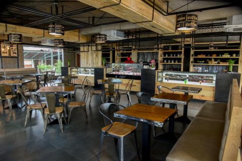 Restaurant, Hotel RK Gardenia in Chandapura