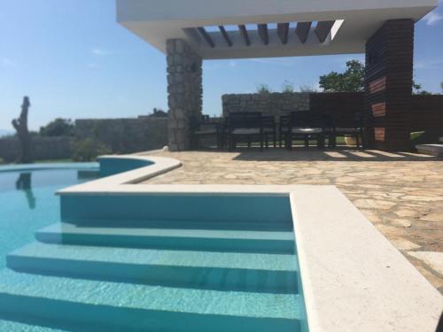 Five-Bedroom Villa with Private Pool and Sea View