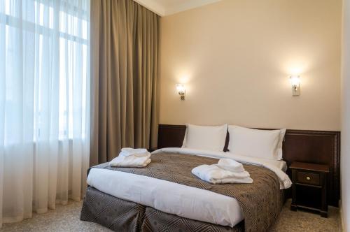 Royal Plus Hotel Royal Plus Hotel is perfectly located for both business and leisure guests in Almaty. The property has everything you need for a comfortable stay. Service-minded staff will welcome and guide you at Ro