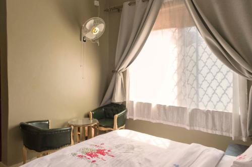 Bed, Pavillion Hotel Entebbe in Kajjansi