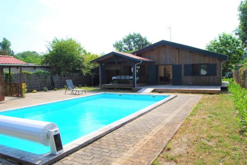 Jolie Maison neuve avec Piscine et 3 Chb proche plages du lac de Cazaux gîte à louer Sanguinet
