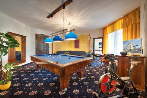 Suite with Balcony and Pool Table