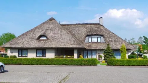 Ferien im Reetdachhaus in Berumerfehn, Deutschland