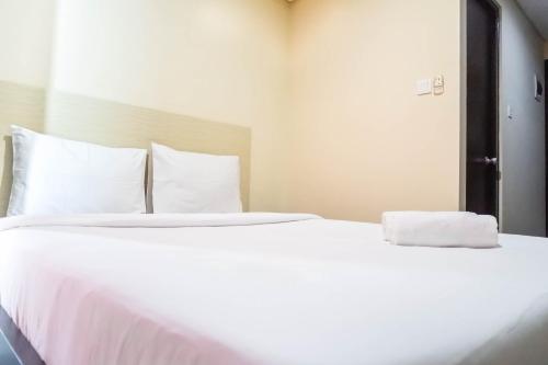 Relaxing Studio Apartment at Tamansari Papilio By Travelio, Surabaya