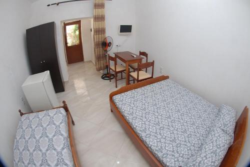 Isufi Guest Houses - image 4