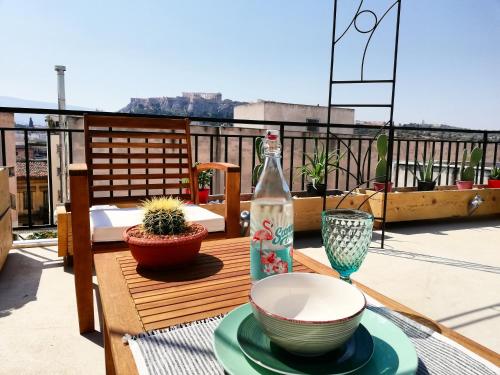 AS jacuzzi on privet roof top with acropolis view