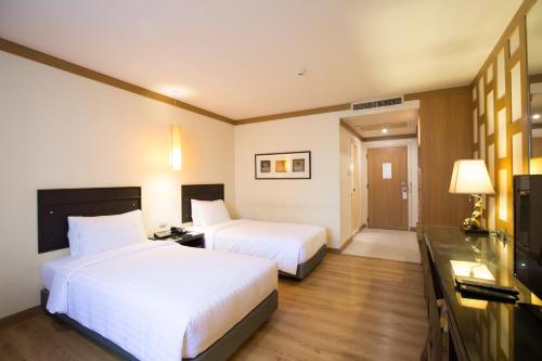 Deluxe Room room in The Tarntawan Hotel Surawong Bangkok