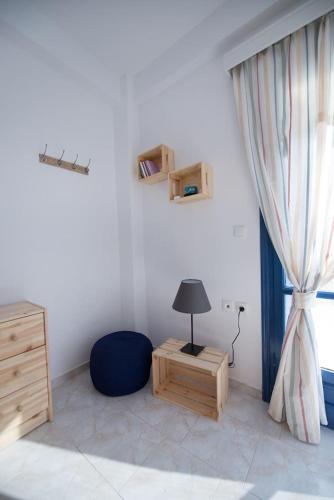 Aquarella-stylish veranda apartment in centre of Poros town