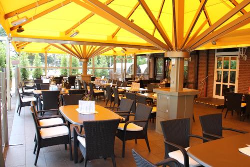 zonă comună salon/TV, Hotel Bugener in Gronau (Westf.)