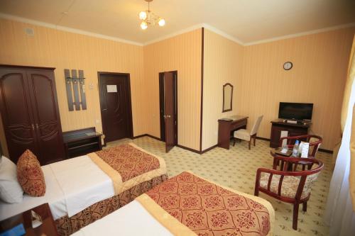 Asia Hotel Fergana Set in a prime location of Fergana, Asia Hotel Fergana puts everything the city has to offer just outside your doorstep. The property offers a high standard of service and amenities to suit the indivi