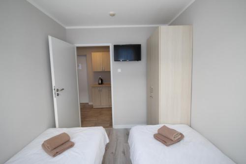 Pod Kominem Pokoje i Apartamenty