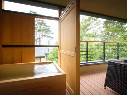 Standard Room with Tatami Area and Open-Air Bath - Ocean View