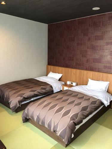 Hotel New Umeya The 2-star Hotel New Umeya offers comfort and convenience whether youre on business or holiday in Ibaraki. Both business travelers and tourists can enjoy the hotels facilities and services. Take adv