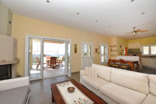 House with panoramic view magical sunset in Syros