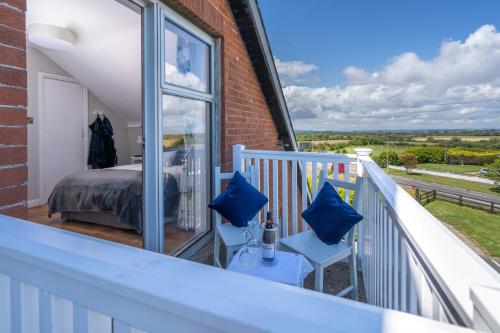 ระเบียง/ชานเรือน, Coral Gables Guesthouse & Campsite in รอสส์เลร์