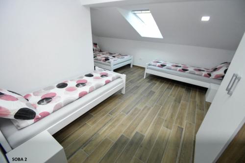 Quadruple Room with Shared Bathroom