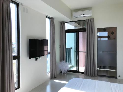 Shared lounge/TV area, The Corner 10 in Rende District