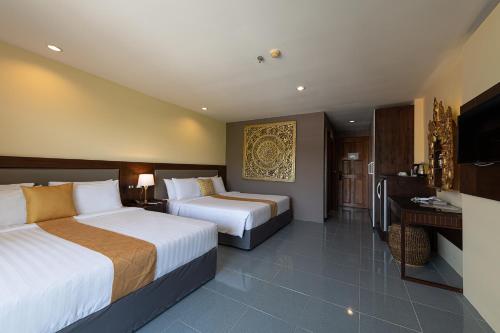 Blue Beach Grand Resort And Spa SHA Plus Stop at Blue Beach Grand Resort And Spa to discover the wonders of Phuket. Both business travelers and tourists can enjoy the propertys facilities and services. Service-minded staff will welcome and 