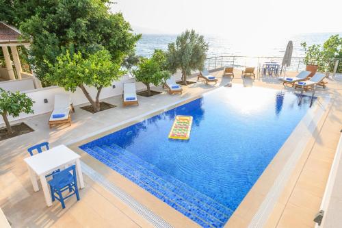 Luxury beach house, private pool, stunning sunsets, villa karpuz