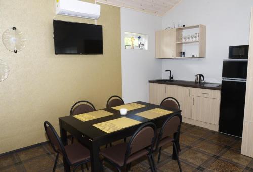 Koplietošanas atpūtas telpa ar TV, Smėlio Apartamentai (Smelio Apartamentai) in Anyksciai
