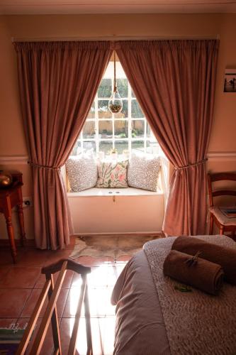 Roses and Pebbles B & B Guest House