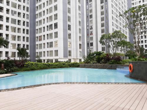 Cozy Studio Room at M-Town Apartment near Summarecon Serpong Mall By Travelio - image 2