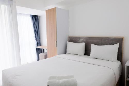 Comfy Studio at M-Town Gading Serpong Apartment By Travelio, Tangerang