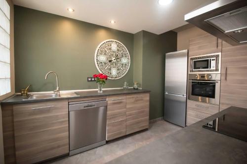 ห้องครัว, Apartmento Obispo Rocamora in โอริฮูลา