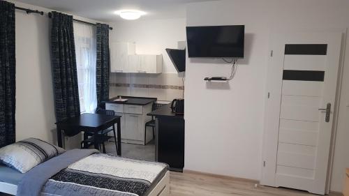 APARTAMENTY MIŁA