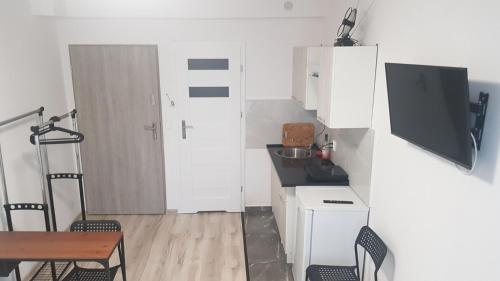 APARTAMENTY MIŁA