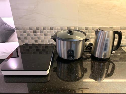 尼诺伊·阿基诺国际机场附近阿维达公寓 尼诺伊·阿基诺国际机场附近阿维达公寓