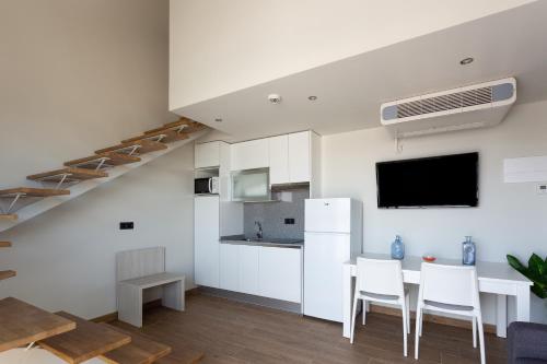 Apartamentos Playa De Los Barcos - image 11
