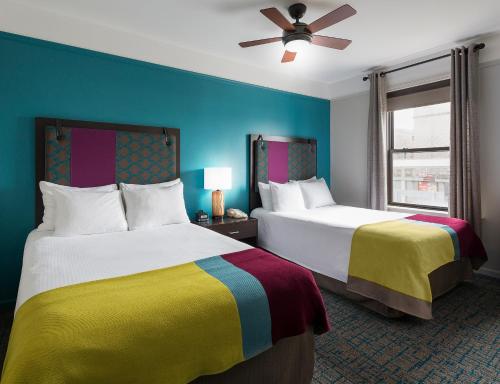 Double Suite with Two Double Beds room in City Suites Hotel