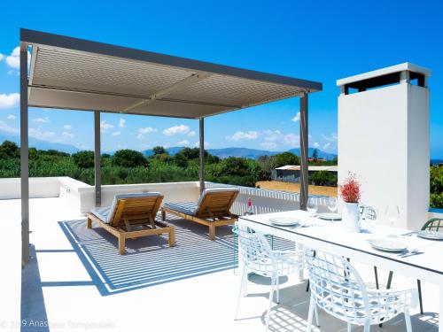 Exterior view, Mikro Livadi Special Lodges - Has an Eco Salt water pool - 150m from the beach in Lappei