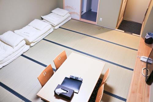 Фотография номера мини отеля Akihabara Nakagawa Inn