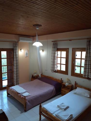 Koutadelias rooms in Kalamos (Argalasti)