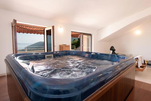 อ่างแช่น้ำร้อน, Vila Harmonia in เวปรินัซ