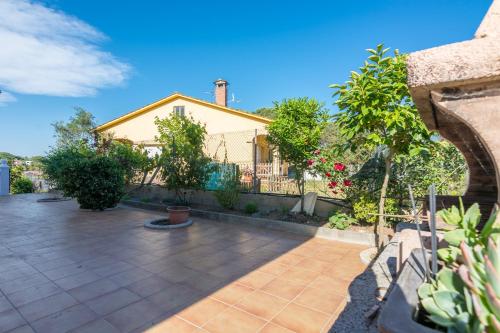 Kert, HomeHolidaysRentals Corts in Fogars de la Selva
