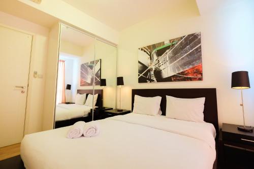 Homey 2BR Apartment at Casa Grande Residence By Travelio, Jakarta