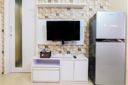 Modern 2BR with City View at Bassura Apartment By Travelio