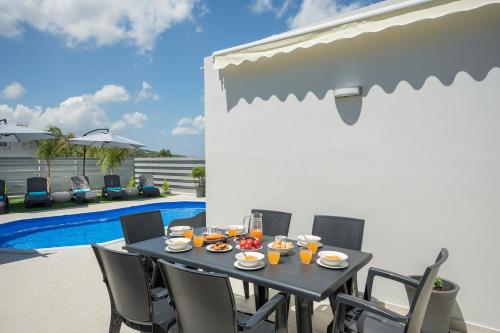 b&m villas near Monumental Olive Tree of Vouves