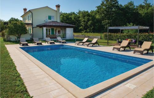  Four-Bedroom Holiday home Labin with a Fireplace 08 in Mali Turini