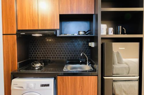 Studio Room Apartment at M-Town Residence near Summarecon Mall Serpong By Travelio - image 3