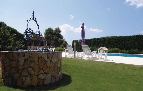  Awesome home in Agioi Apostoloi with 2 Bedrooms, WiFi and Outdoor swimming pool in Áyioi Apóstoloi