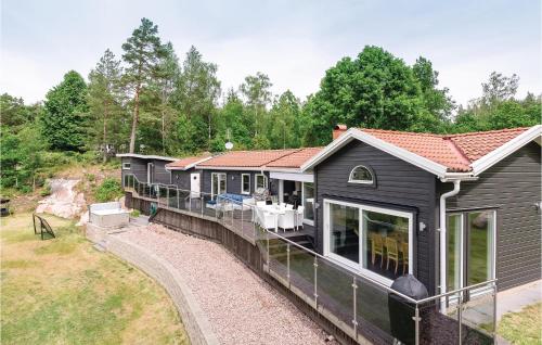 Stunning home in Boxholm with 4 Bedrooms, Sauna and WiFi