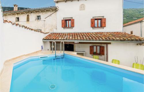  Four-Bedroom Holiday Home in Lanisce in 52422 Lanišće